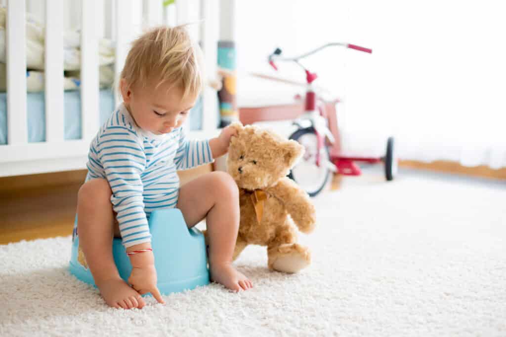 Cute,Toddler,Boy,,Potty,Training,,Playing,With,His,Teddy,Bear